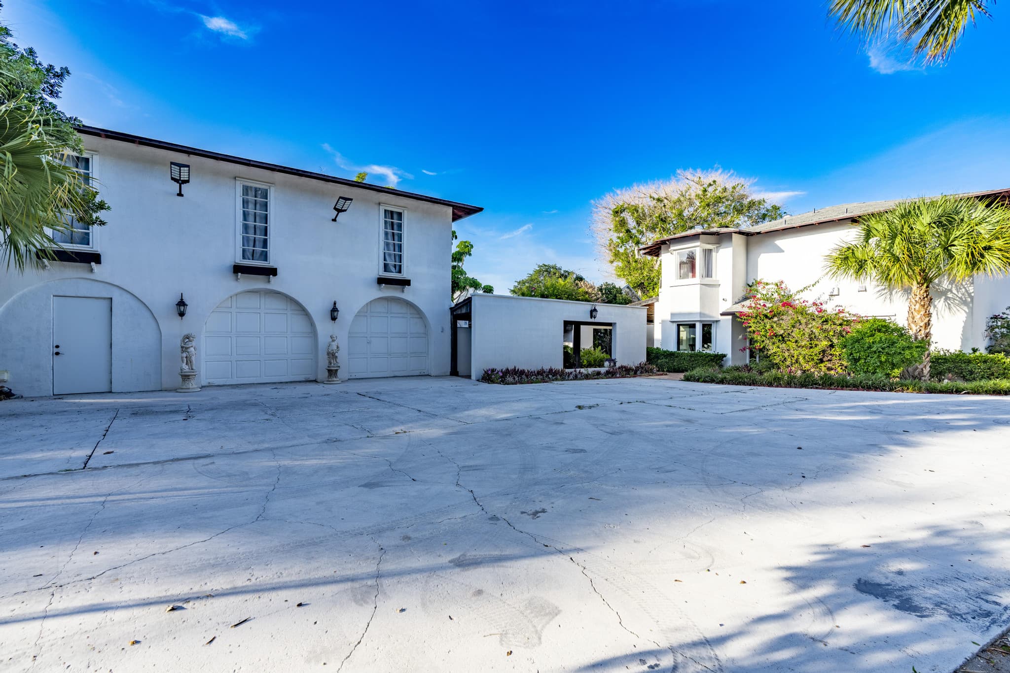 White estate home with three-car garage at 1009 Indian River Rd