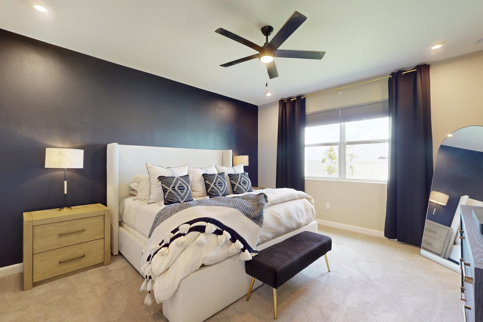 Bedroom with dark accent wall