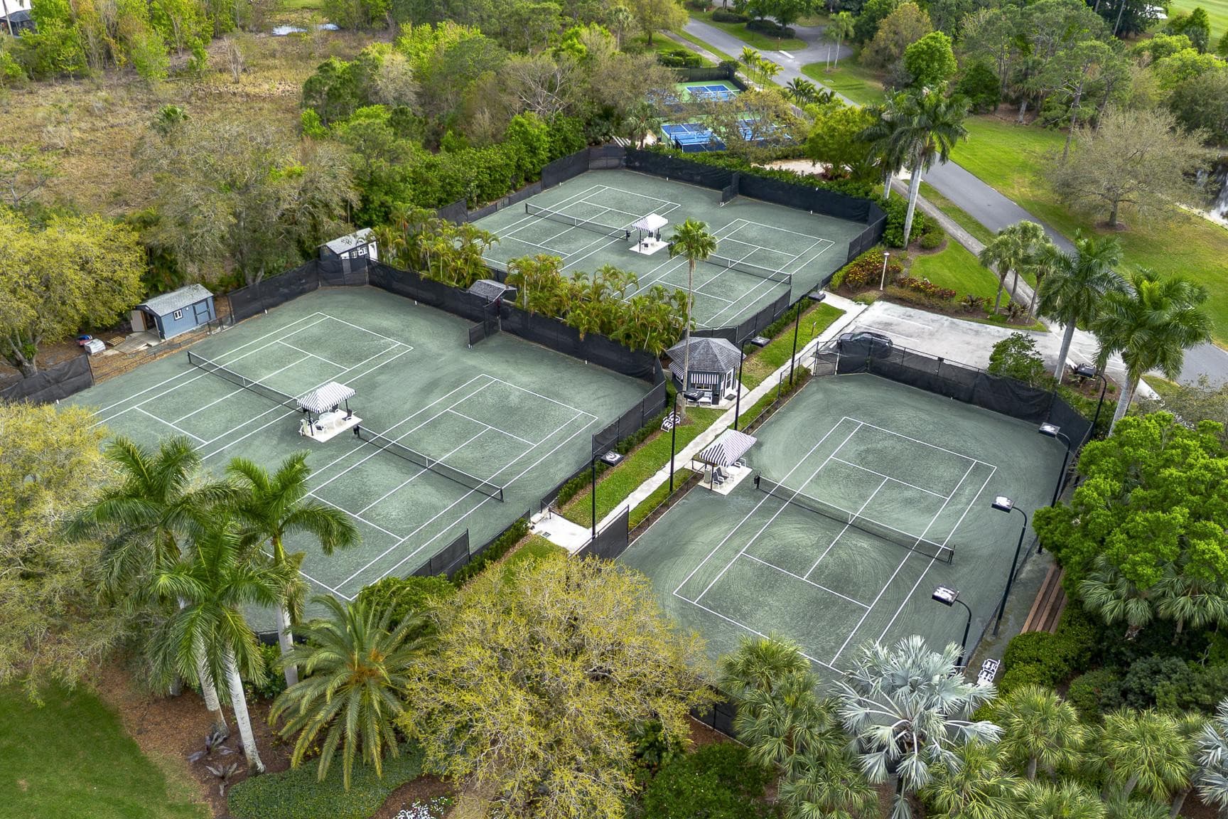 Drone aerial over community tennis courts