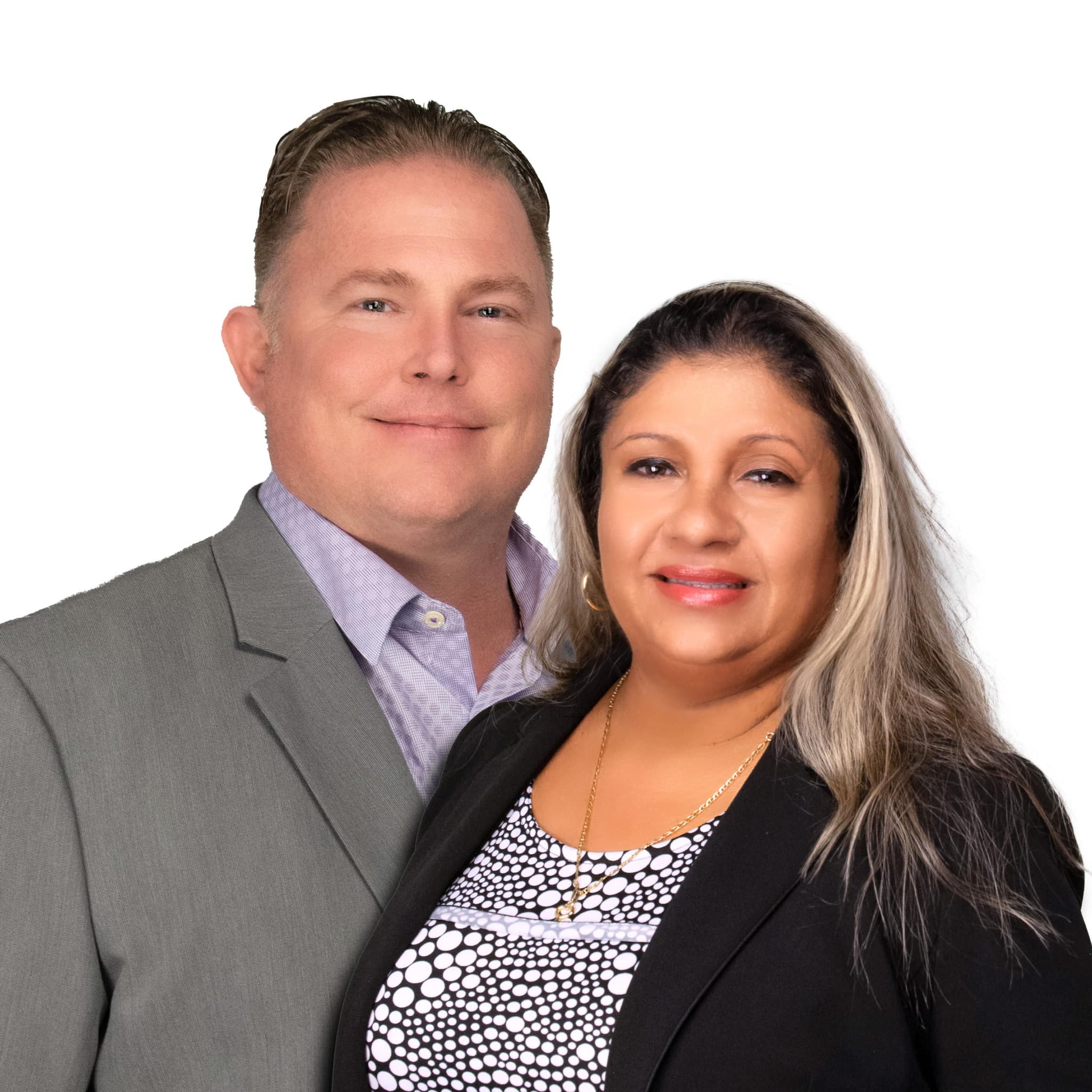Two-person business headshot on a gray backdrop